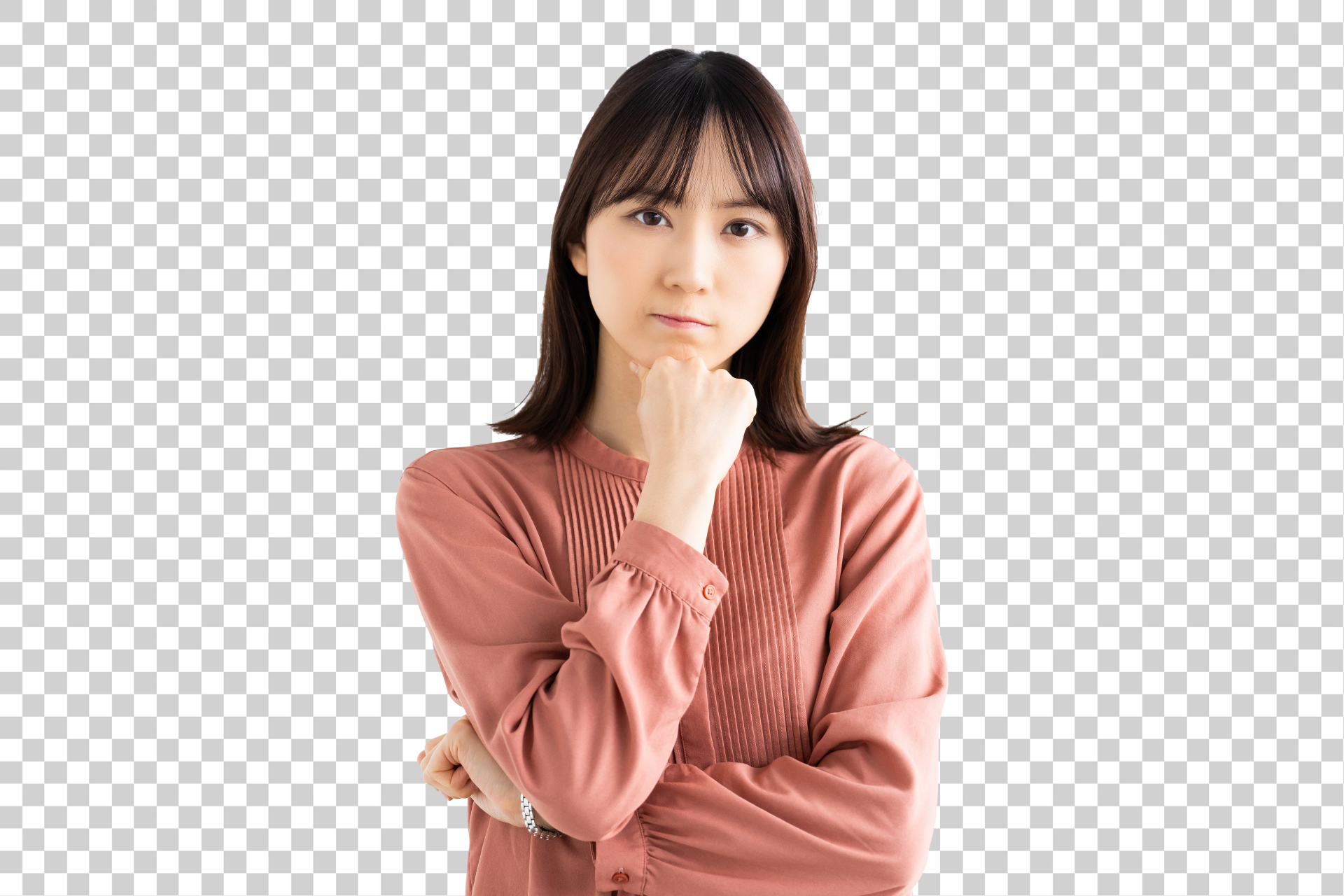 疑問を思い浮かべる女性