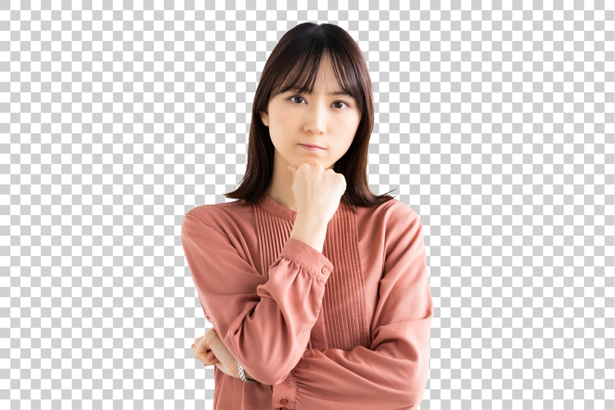 疑問を思い浮かべる女性のイメージ